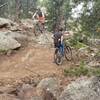 Decent three foot roller drop near the peak, our first two riders to go over it, just a few minutes after we finished the trail to the peak