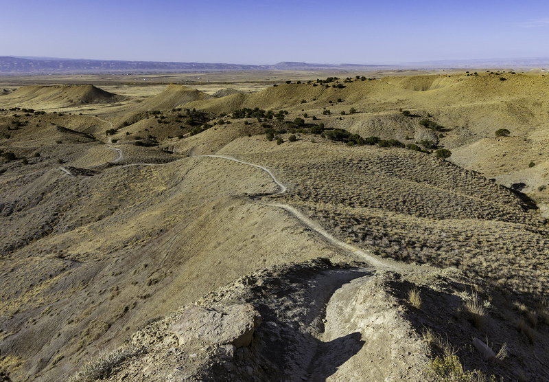 Riding the ridge. A series of fast, steep, slightly exposed rollers with 360° views.