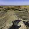 Riding the ridge. A series of fast, steep, slightly exposed rollers with 360° views.