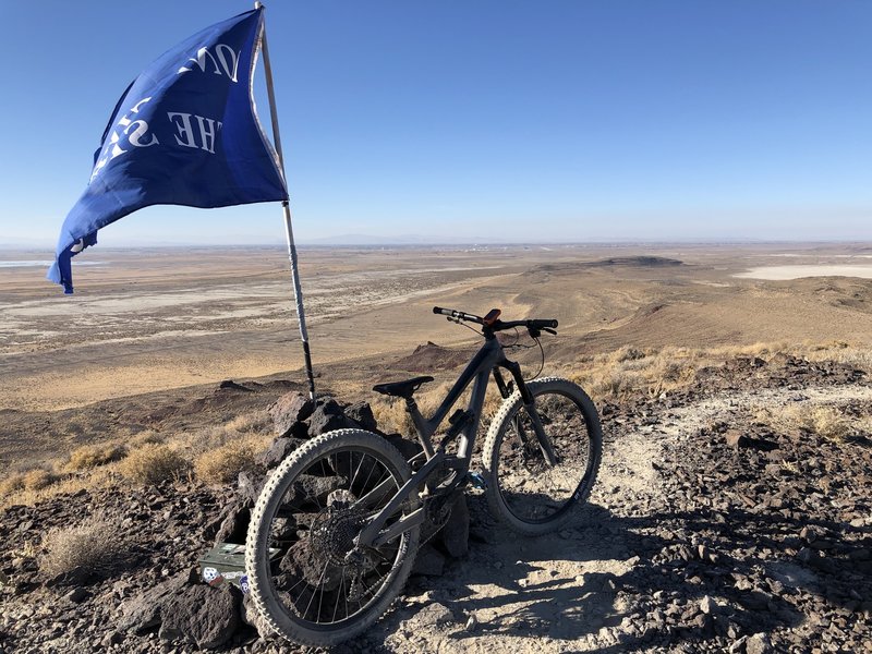 The Peak of Loose Tufa Trail. with a Sign in Cache Box and Goodies.