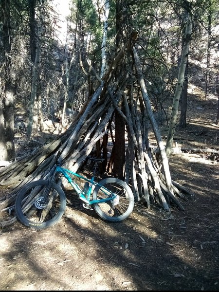 My bike next to a teepee