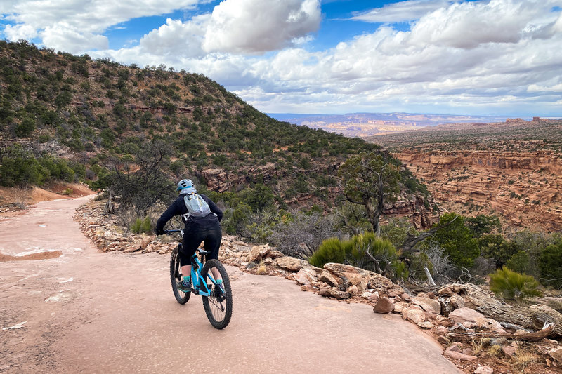 Ashley passes by on one of the few smooth sections of road.