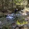 Descending the trail across the Upper Six Mile Creek