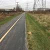 Bike path is next to the power lines most of the time