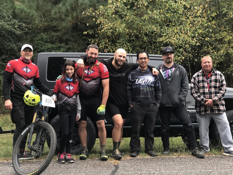 Community mountain bikers building camaraderie with family and friends.