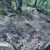 Looking up at the steep drop on South Leaf. Note the drop-off on the right.