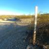 This is the trail marker for the "D-road Climb" (BLM 8112D) at the bottom, looking East from the main road (Rasmussen Extended).