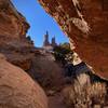 An unusual view of Monster Tower and Washerwoman Arch from Buck Canyon