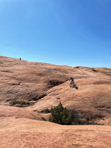 Just one of the hundreds of ups and downs on Slickrock. Don't be deceived by the distance. It's the longest 11 miles you've ever seen.