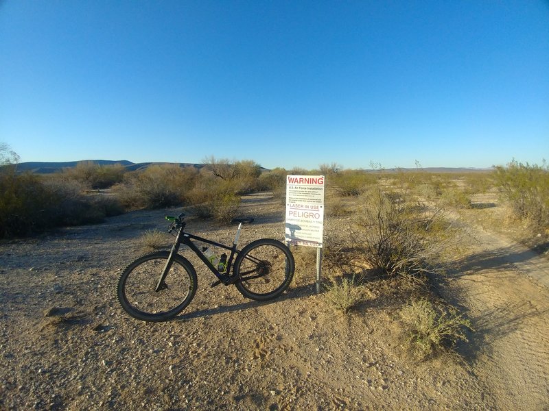 "WARNING U.S. Air Force Installation..." "Laser in Use". These signs mark the boundary between BLM & BMGR. BMGR requires a free annual permit from Luke Sportsman.