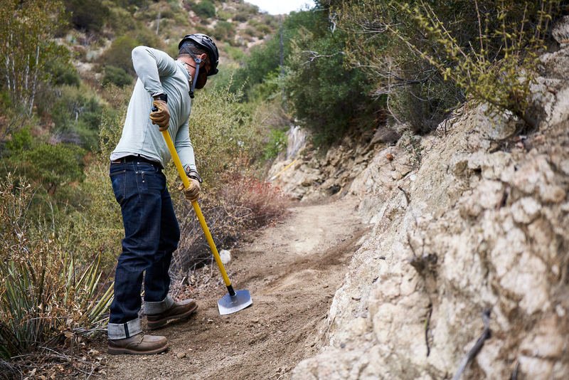 Lowelifes Respectable Citizens Club volunteer working to restore the Condor Peak tread