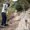 Lowelifes Respectable Citizens Club volunteer working to restore the Condor Peak tread