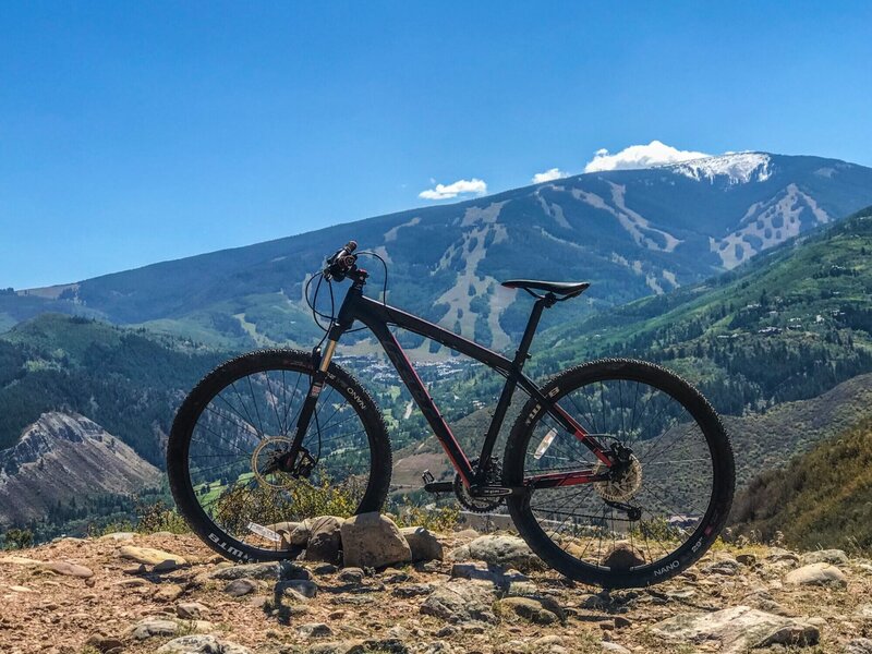 Although off the trail and you are not allowed to saddle the bike; a 50 yard hike will bring you to beautiful view of beaver creek in the background with the town of Avon beneath.