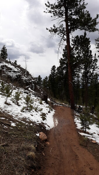 Descending past Climbing Area with some snow still on the ground