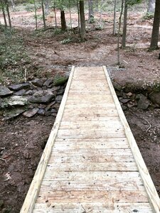 Long bridge leading into a series of turns