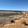 View of the Colorado River with a train rolling by