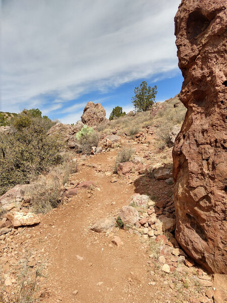 Winding singletrack through the western boulder fields of Black Canyon.