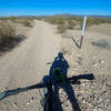 Looking N down the Desert Luge (BLM 8110A), with Batamote Mountain on the horizon.