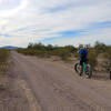 Taking a water break on the way back to Ajo down Pipeline Road, near the intersection with 10-Mile to Pipeline (BLM8105). Fattire Mike slurping down H2O.