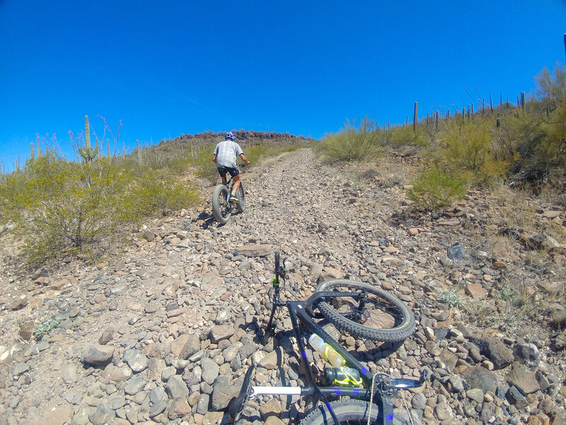 Ed showing me why I should not have switched out my 26x4" tires for 29x2.8". Lesson learned! This climb requires skill, luck, and most likely some walking! Keep in mind it is a long helicopter ride to the nearest hospital (if you can get cell service!).