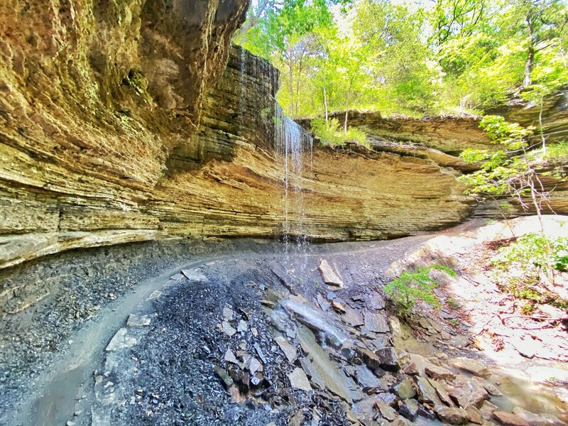 Behind the waterfalls before the rock garden on Devils Racetrack near the end.