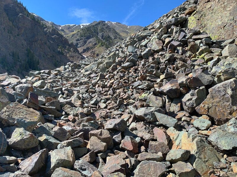 Believe it or not, there is a rideable trail through this scree field.