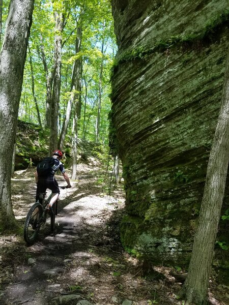 Riding through the big rocks on the Three Sister's trail.