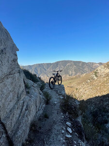 Loose tight singletrack w/ exposure. Fun ride.