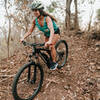 Cecilia cruising the singletrack trails found on Jaguarundi.