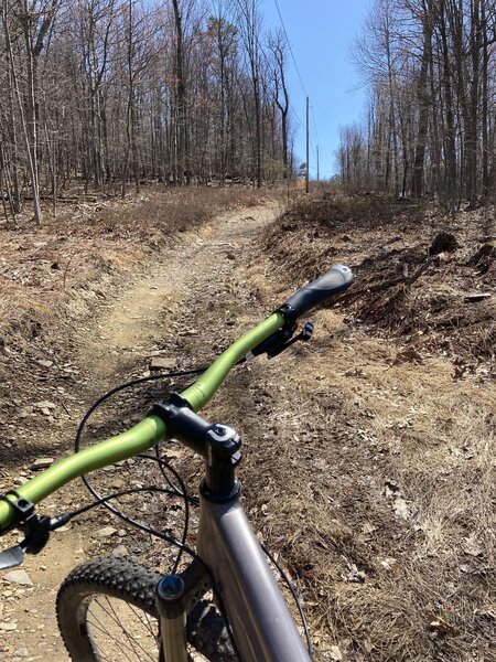 Power Line veers right and gets steeper.