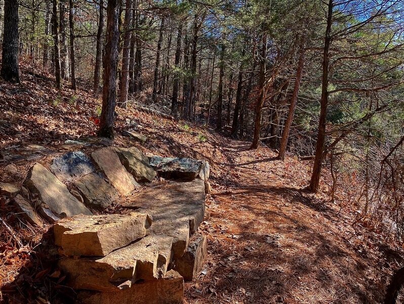 Stone couch on the side of the trail