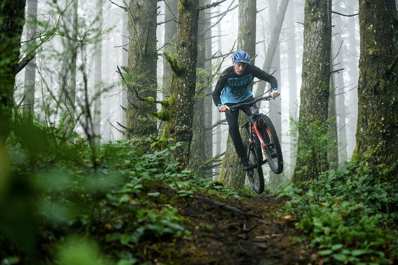 The builder of Swirlz, Gerry Creighton, floating over some roots on Swirlz.