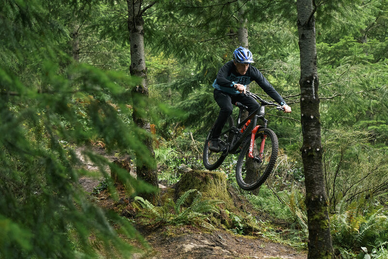 Popping off of one of the stumps on the optional left line after the rock slab.