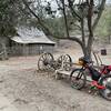 Old barn off of Middle Ranch Road with some ancient wagon wheels and plows.