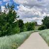 Fairly narrow paved trail. Taken June 2021.