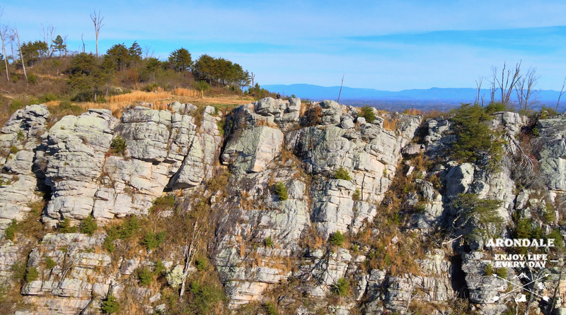 Sweet drone shot of rocky face cliff  - the lookout just before the final climb.