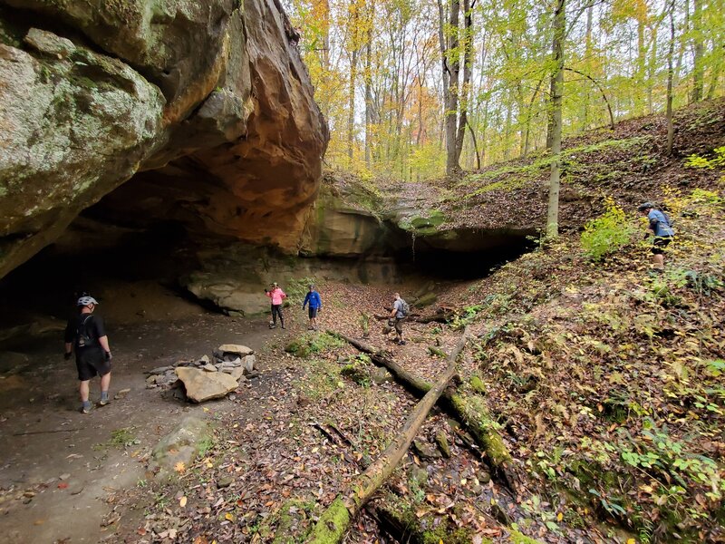 Riders on the Archers Fork Loop Trail stop to check out the Great Cave!