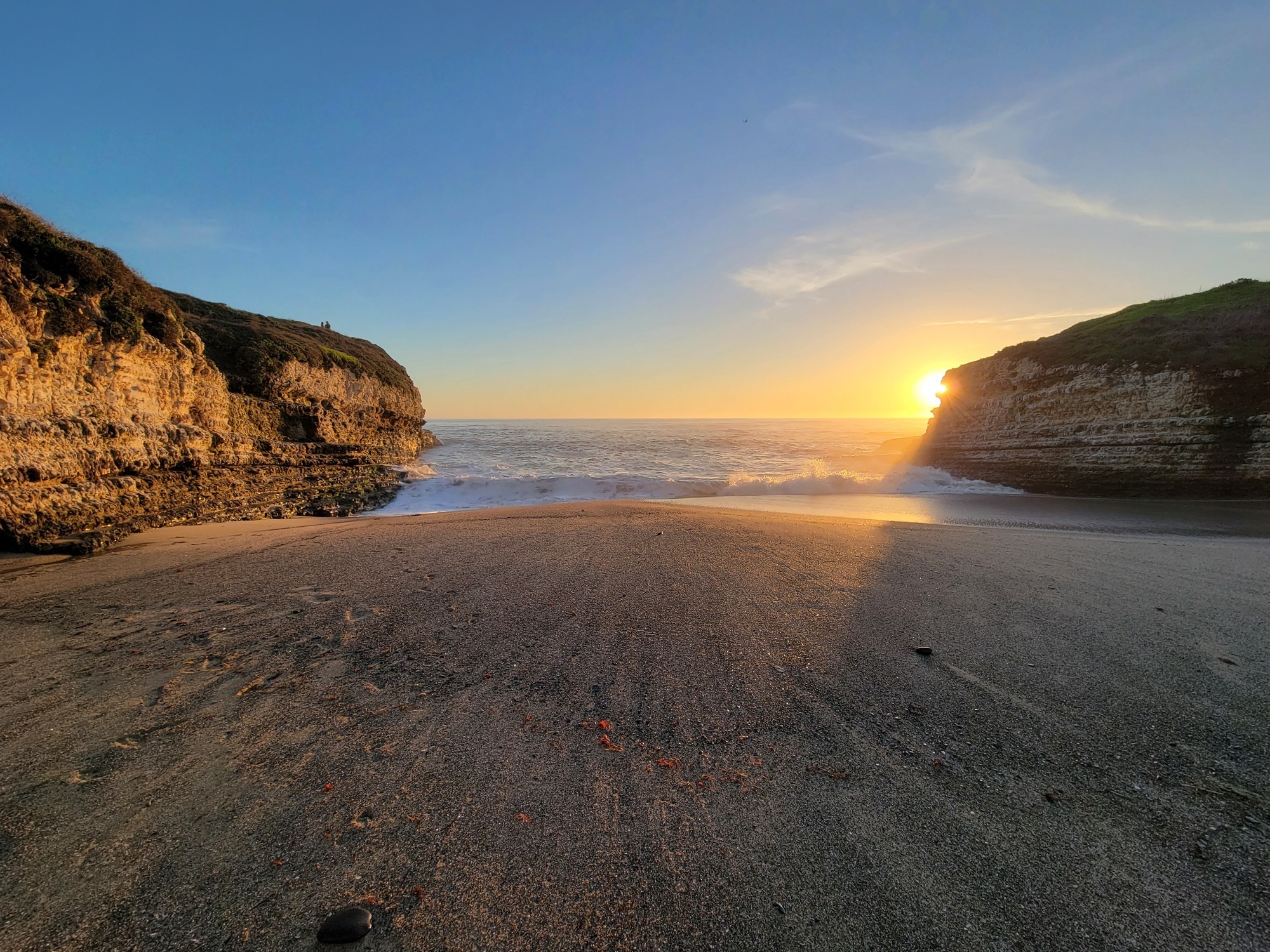 Sunset on the deserted Fern Grotto Beach