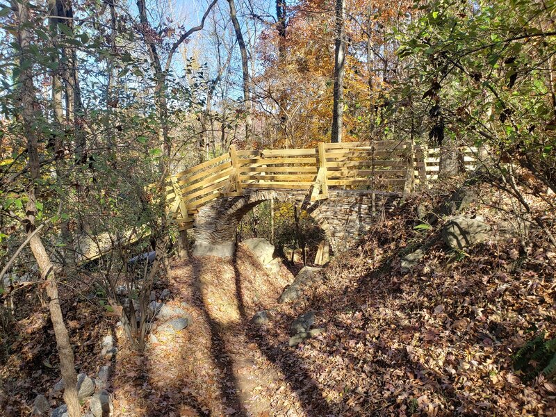 Stone Arch on Abu Run Trail. First you ride under, then 1/2mi later over. Arch has an 8ft. clearance.