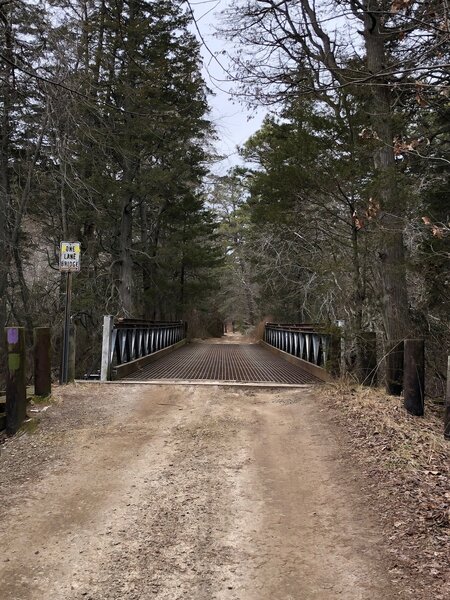 Turn left before Quaker Bridge