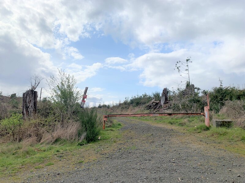 Northern access gate. Very limited parking just barely off the road. Use the southern gate instead.