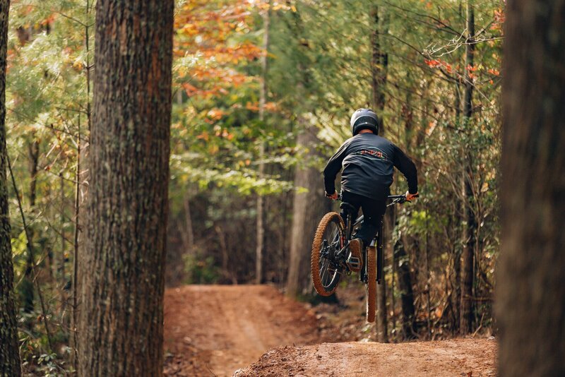 On the upper portion of Roli Noli at Unaka Bike Park; Photo Credit Robert King Photography