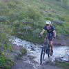 Great pic of a rider who passed us going through the mountain stream.