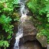 Falls on a steep run alongside the Cranberry Tri-Rivers Trail.