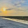 Looking Easterly just after sunrise while riding NE on the concrete levee on the N side of Fran Reich Preserve.