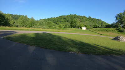Head toward the shed to continue on the Old Farm Trail.