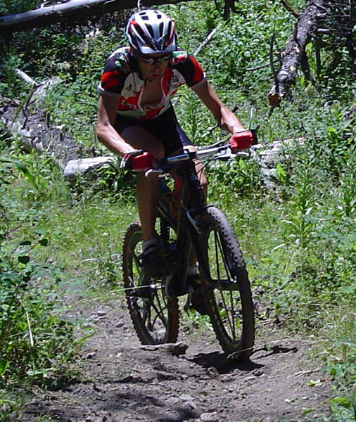 Grinding up the first of three testers on the Super V circa 1998; trail has since been rerouted for gradient and erosion control.