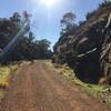 Rail trail cut through rock face.