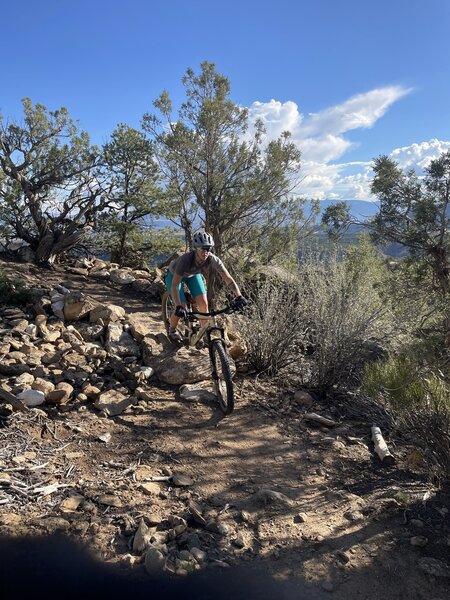 Jennie dropping through the final switchback.