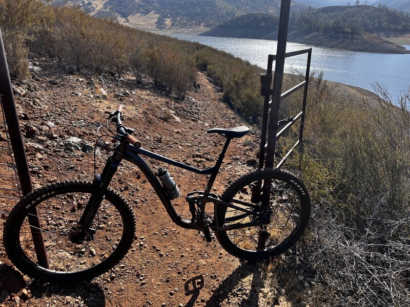 Gate at top of a fairly rocky, technical climb and decent….